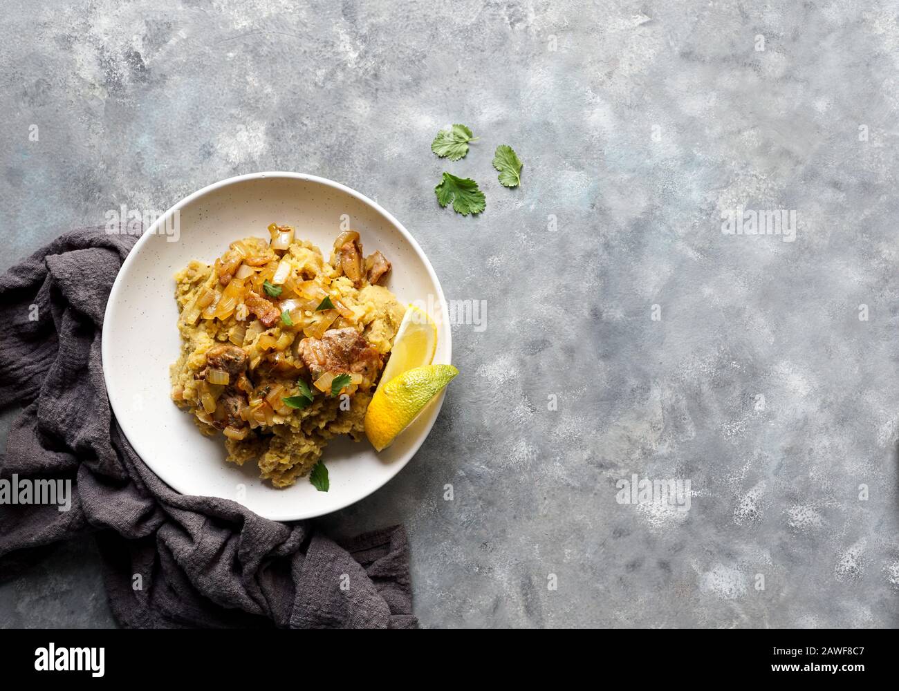 Fufu de platano verde maduro, tacaho, Mofongo, mashed  boiled plantains with porc meat, onion. Puerto Rico.  Amazonian cuisine, Peru, Cuba Stock Photo