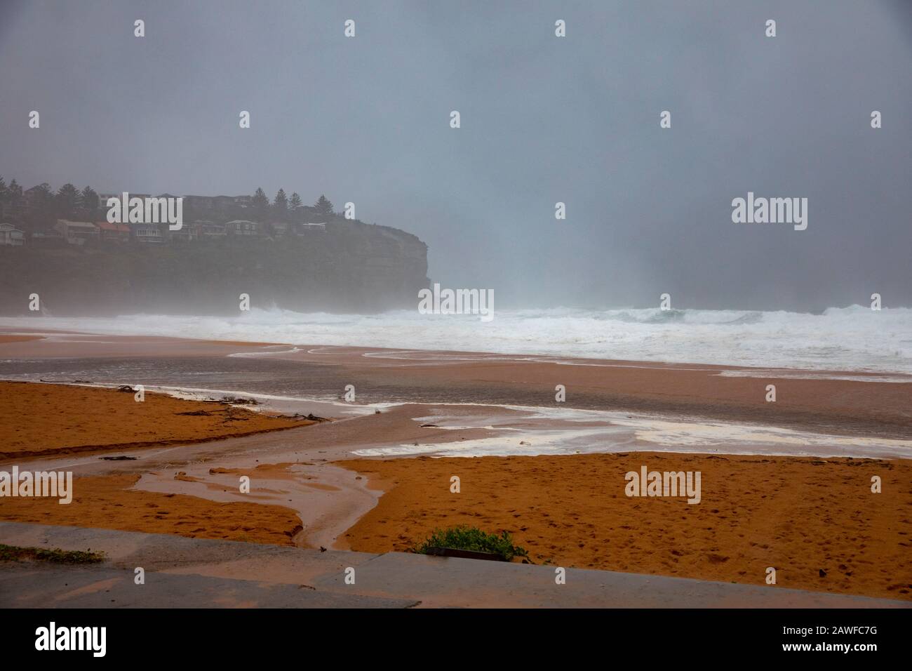 Sydney, Australia. 9th Feb 2020. Wild weather drenches sydney, bilgola beach is closed on a summers day as heavy rains fall over Sydney combine with a king tide, Bilgola Beach, New South Wales Australia -live news image Credit: martin berry/Alamy Live News Stock Photo