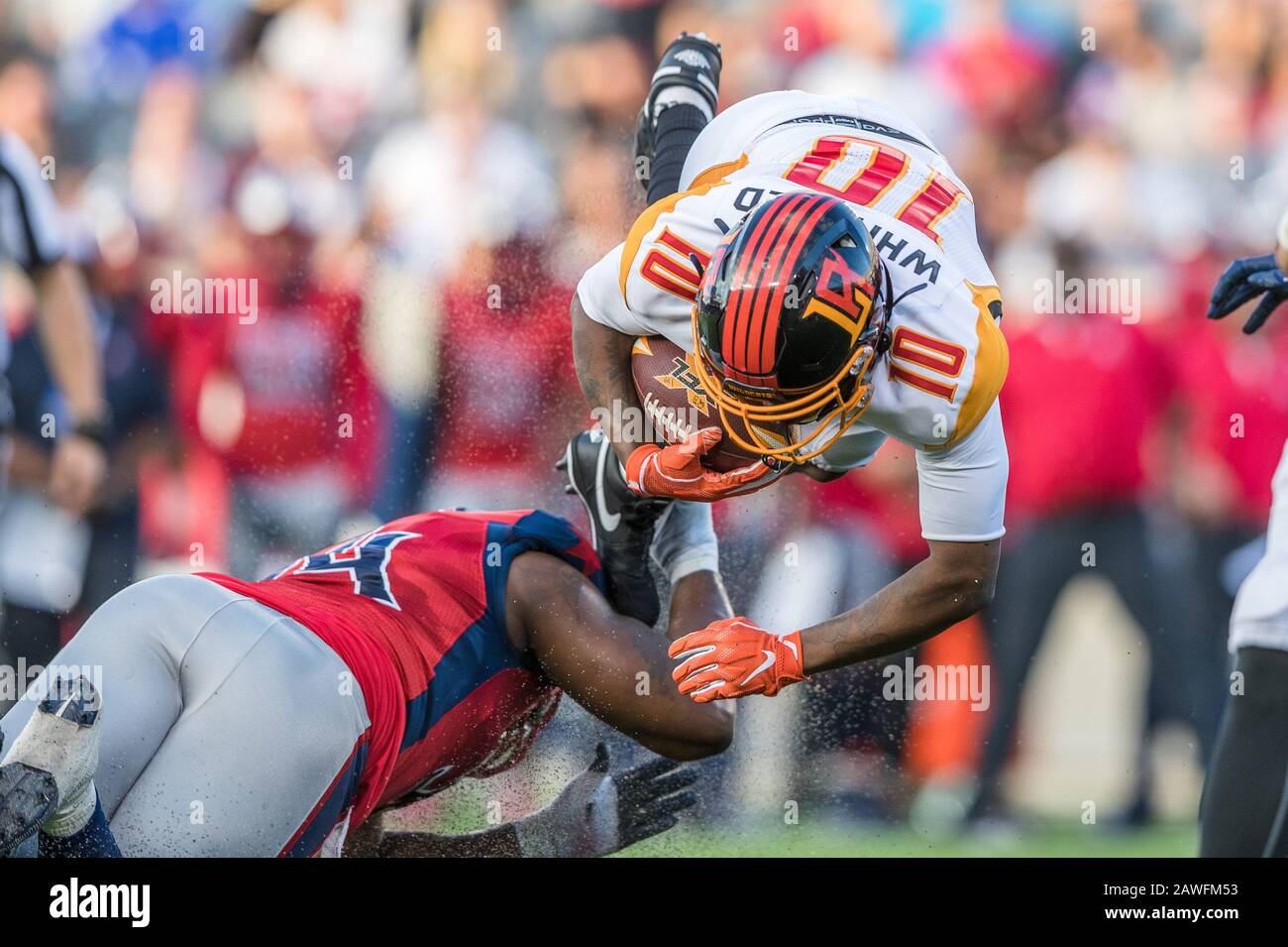 Houston, Texas, USA. 8th Feb, 2020. Los Angeles Wildcats wide receiver Kermit Whitfield (10) is upended by Houston Roughnecks defensive end Kony Ealy (94) in the XFL game between the Los Angeles Wildcats and the Houston Roughnecks at TDECU Stadium in Houston, Texas. Prentice C. James/CSM/Alamy Live News Stock Photo