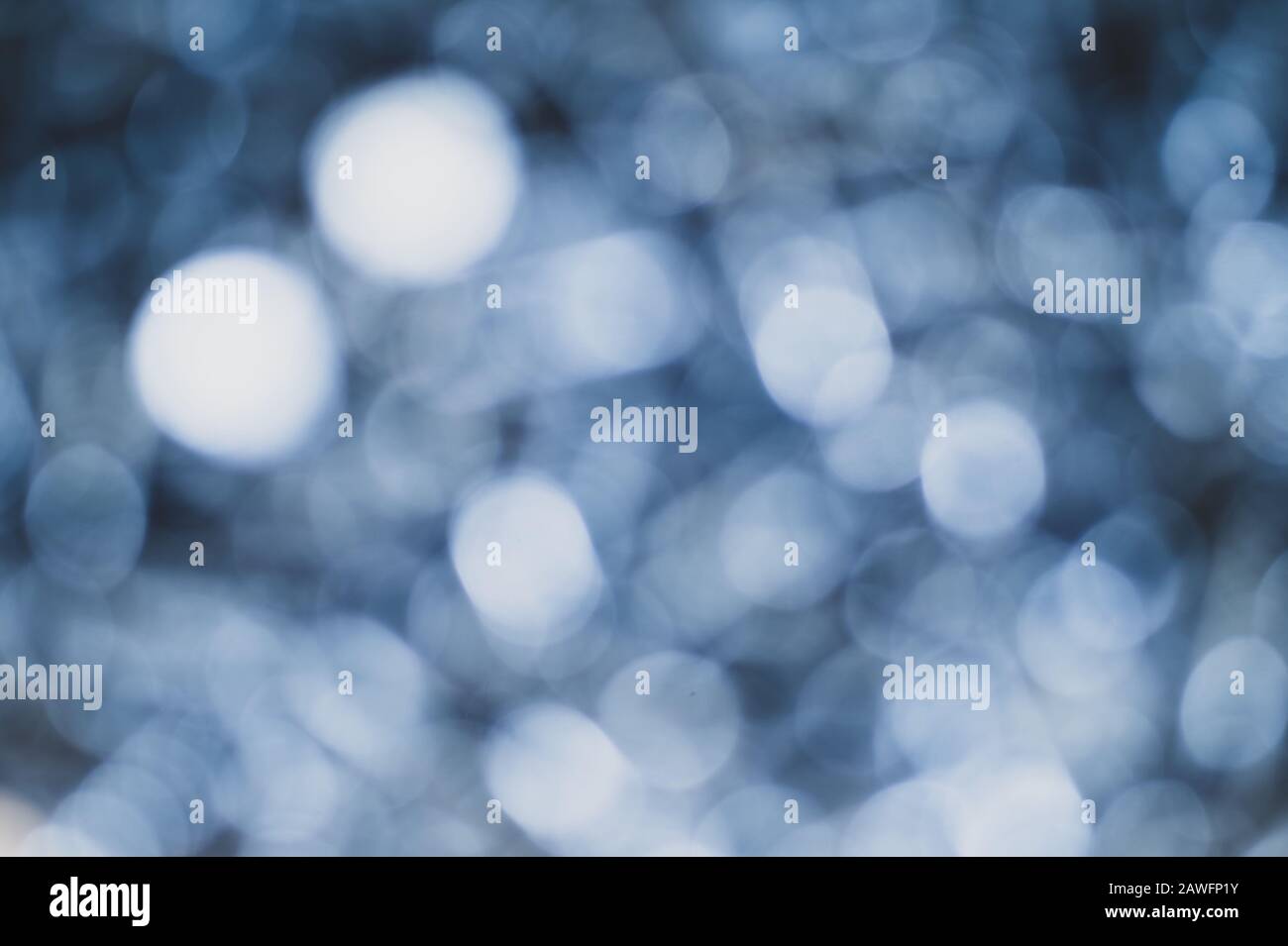 Abstract blue bokeh background. sparkle lights texture Stock Photo - Alamy