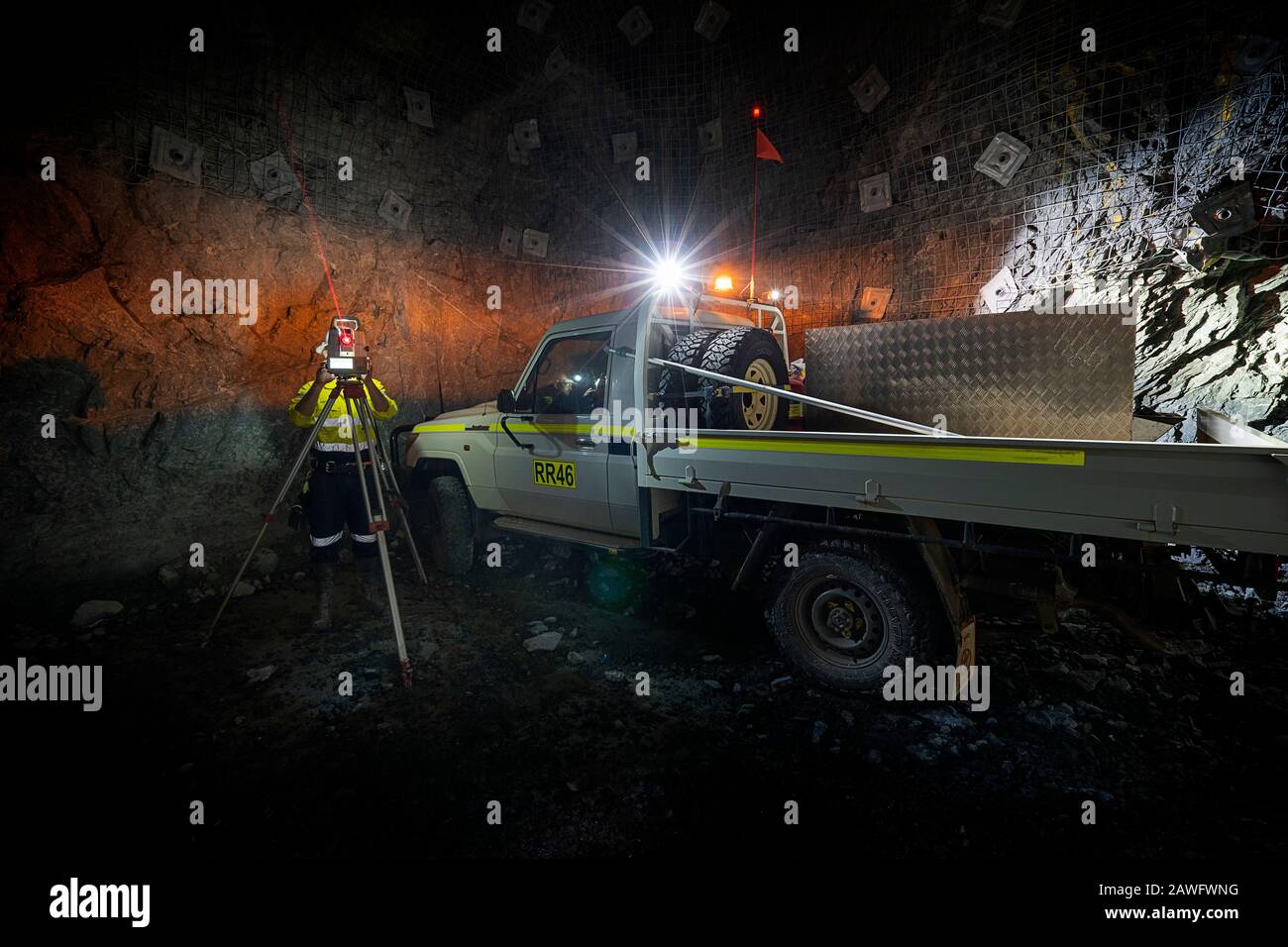 Surveyor Working In Underground Gold Mine Western Australia Stock surveyor-working-in-underground-gold-mine-western-australia-stock