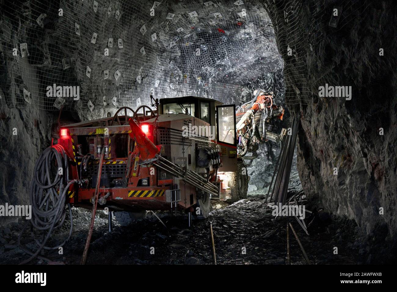 umbo Drill being set up in an underground mine Stock Photo