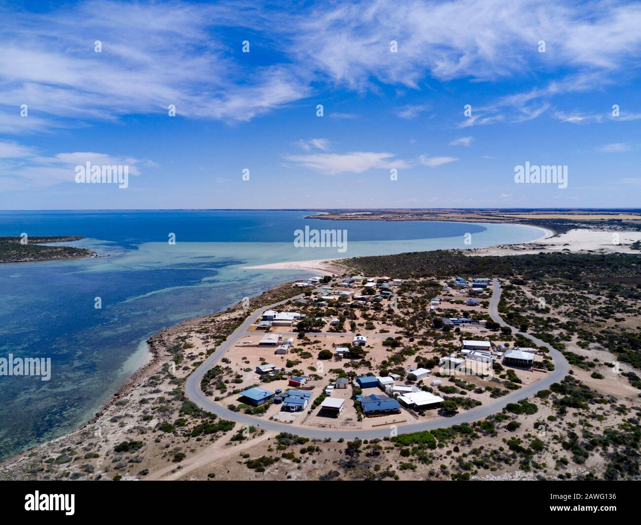 Aerial of holiday and fishing shacks on the waterfront at Eba Anchorage