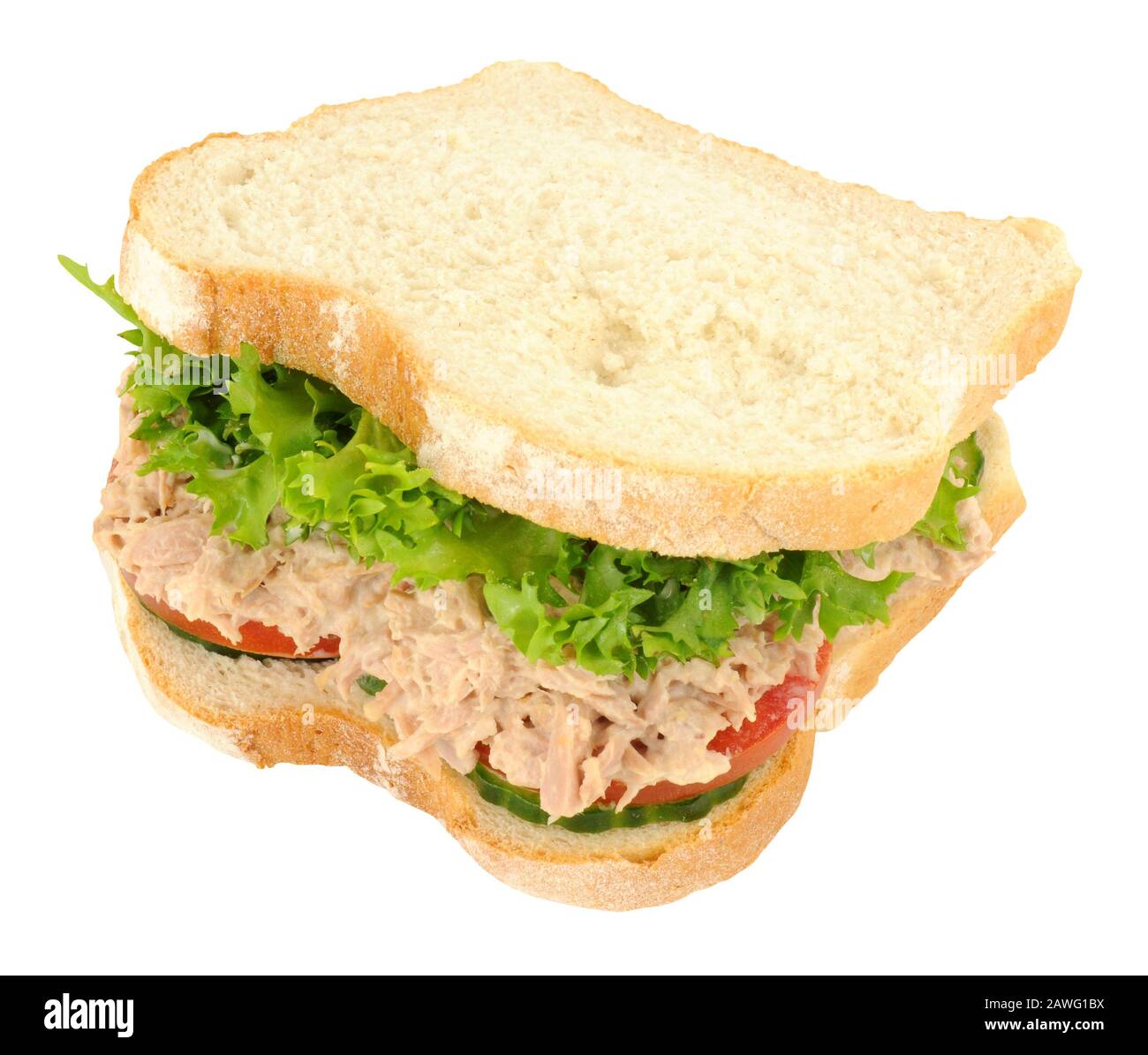 Tuna and salad filled sandwich in thick white sliced bread isolated on