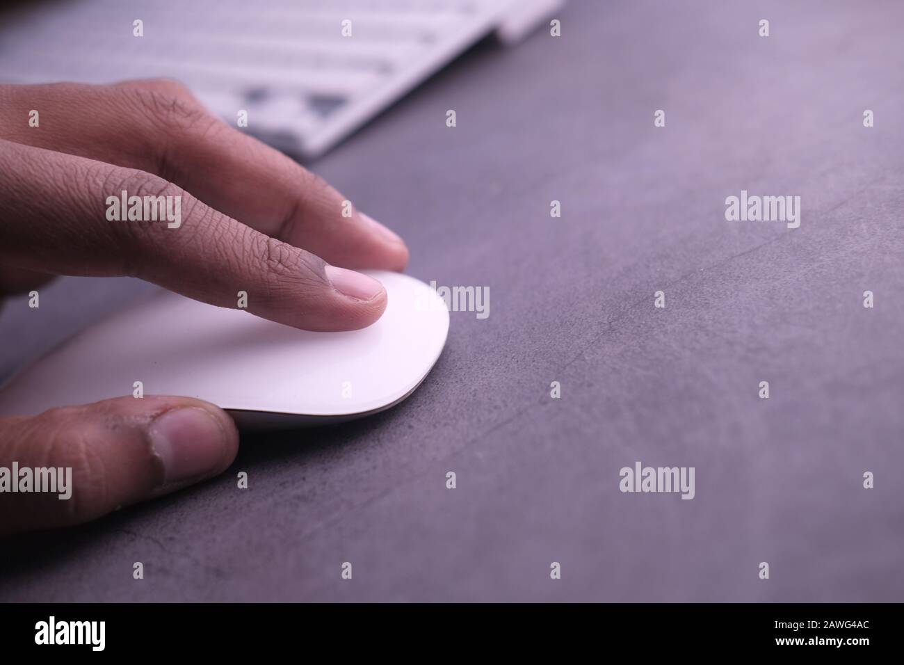 man hand use computer mouse on table , closeup  Stock Photo