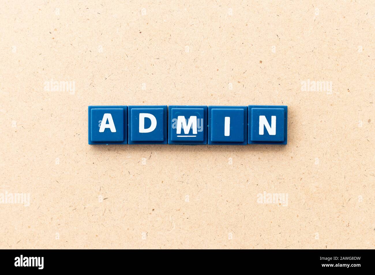 Tile letter in word admin on wood background Stock Photo - Alamy