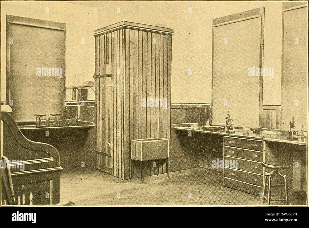 Annual report of the Storrs Agricultural Experiment Station, Storrs, Conn . Fig. 2.Room No. 2. Dust-proof Room of Dairy Bacteriology Laboratory. This dust-proof room is six by eight feet in size, entirely ofglass set in putty so that dust cannot enter. The room is wellsupplied with shelves for the storage of sterilized glassware.In this room cultures may be made with very little danger ofexternal contamination.. Fig. 3. Cold Storage Chamber of Dairy Bacteriology Laboratory. Stock Photo