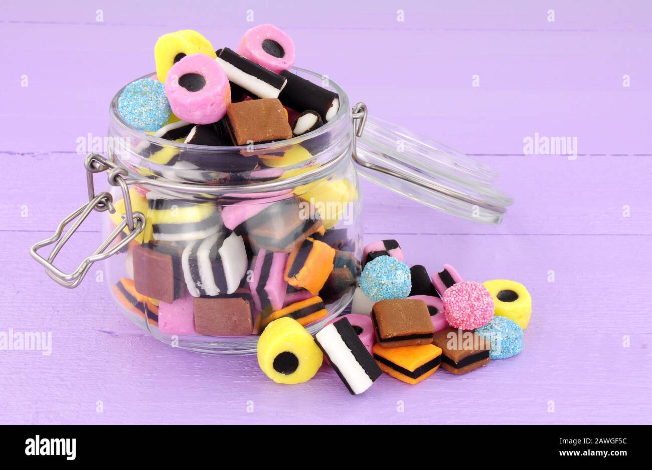 Jar filled with traditional liquorice allsorts candy sweets Stock Photo