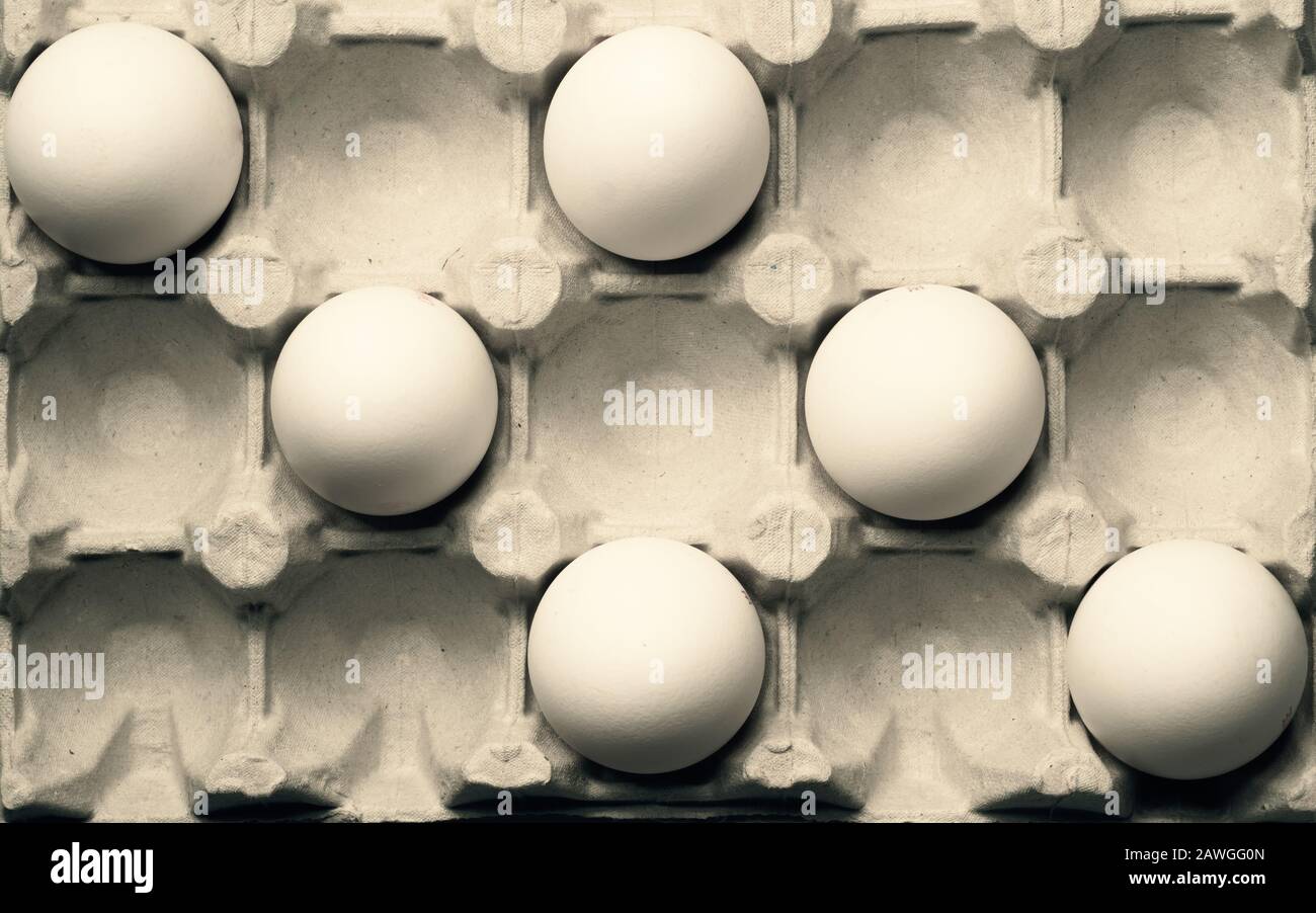 White eggs in carton box background. food ingredient. protein nutrition. healthy breakfast. poultry egg Stock Photo
