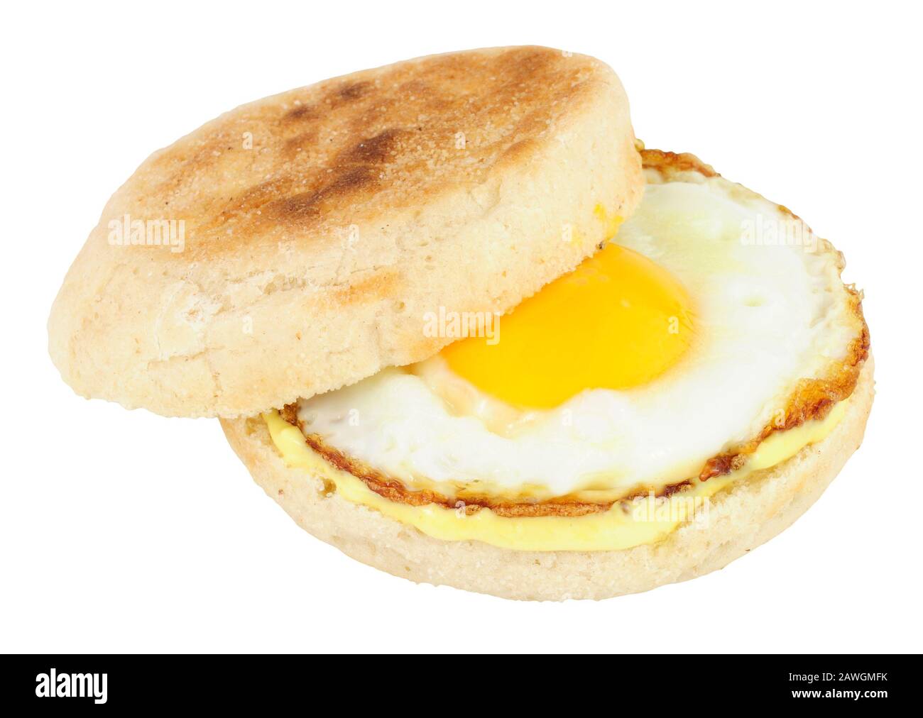 Fried egg filled English muffin sandwich isolated on a white background Stock Photo