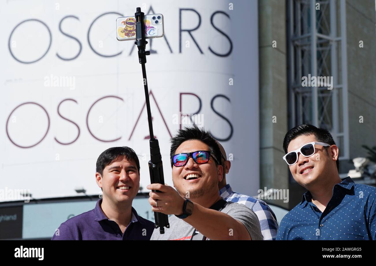 Parasite director Bong Joon Ho and cast members walking on the red carpet  at the 92nd Annual Academy Awards held at the Dolby Theatre in Hollywood,  California on Feb. 9, 2020. (Photo