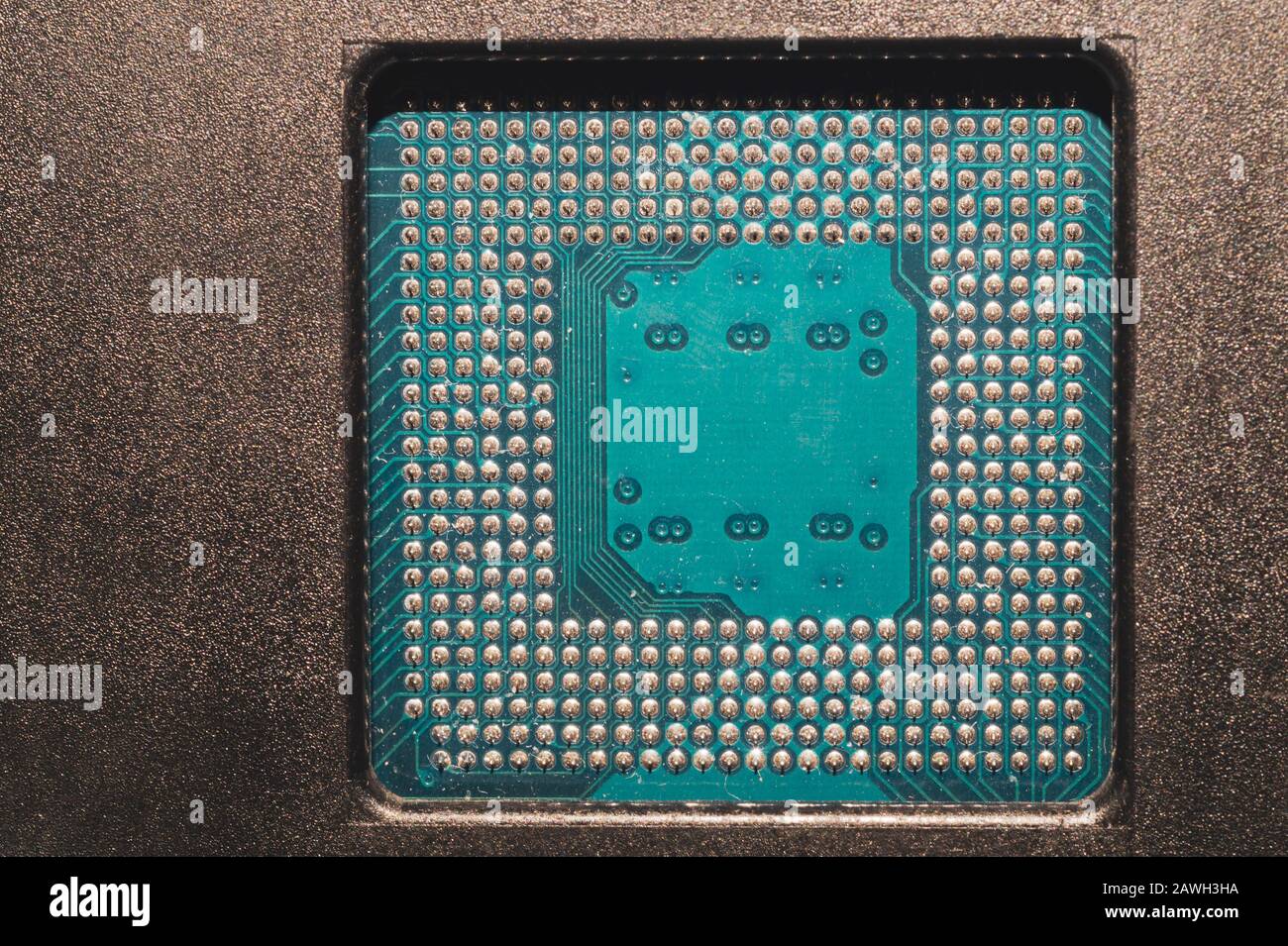 Processor pins macro. computer motherboard close up. cpu pins on a