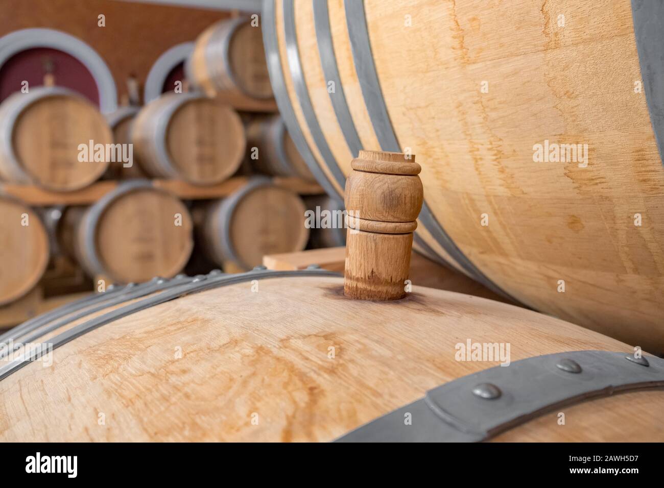 Cork of a wooden wine barrel in wine cellar Stock Photo Alamy