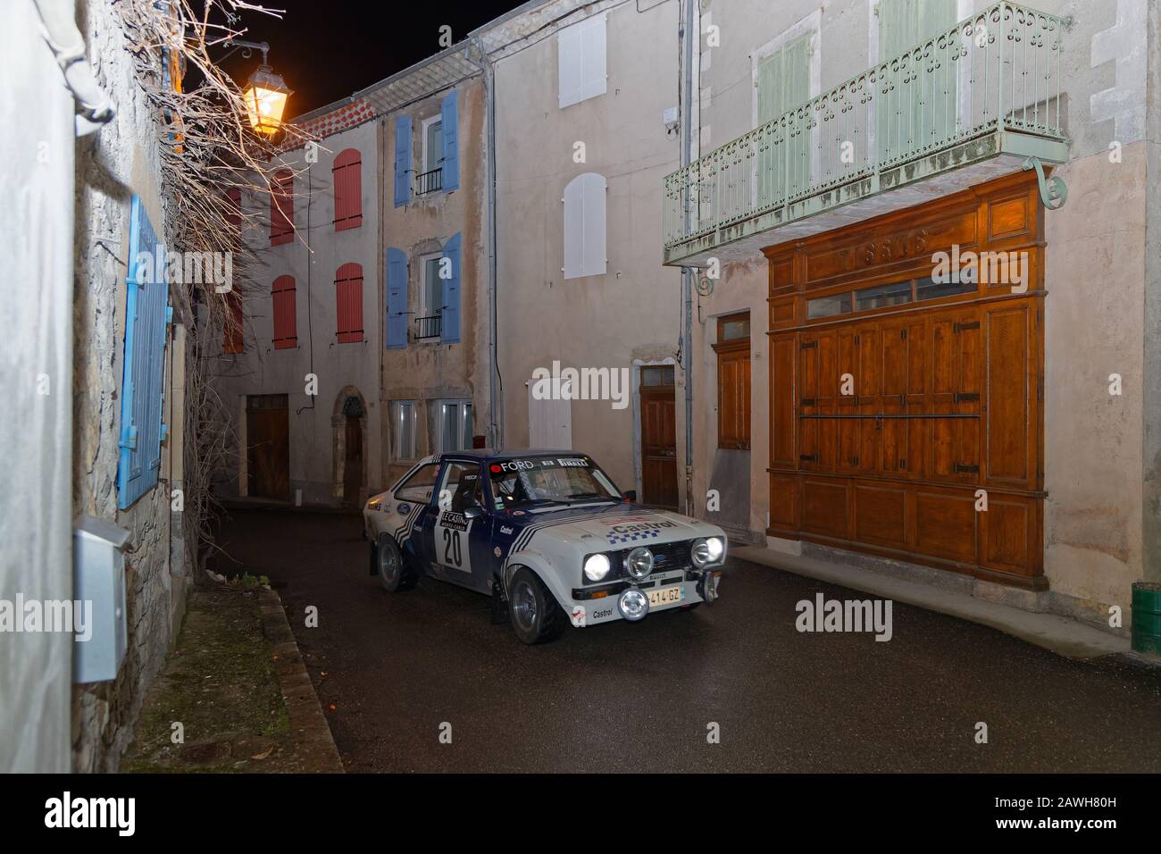 SAINT-NAZAIRE-LE-DESERT, FRANCE, February 4, 2020 : Historic Monte-Carlo Rally runs in the night. This 23rd edition hosts 310 teams from 28 countrie Stock Photo