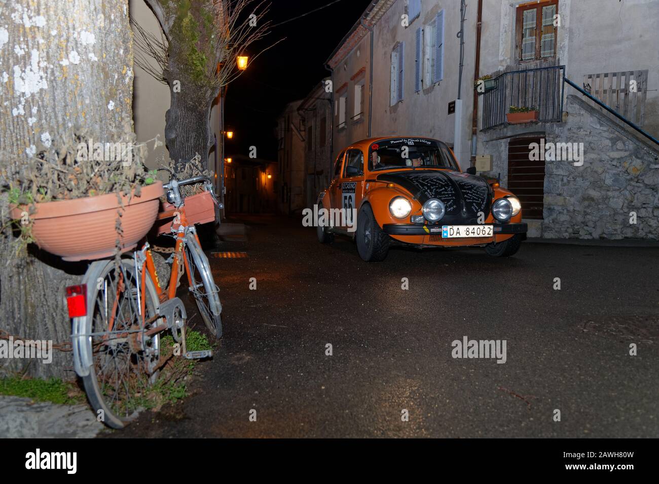 SAINT-NAZAIRE-LE-DESERT, FRANCE, February 4, 2020 : Historic Monte-Carlo Rally runs in the night. This 23rd edition hosts 310 teams from 28 countrie Stock Photo