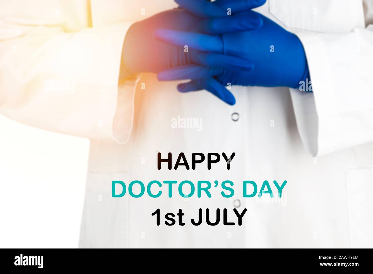 Blurry Image Of Doctor Hands With Text Happy Doctor S Day 1st July On White Background Selective Focus And Crop Fragment Stock Photo Alamy