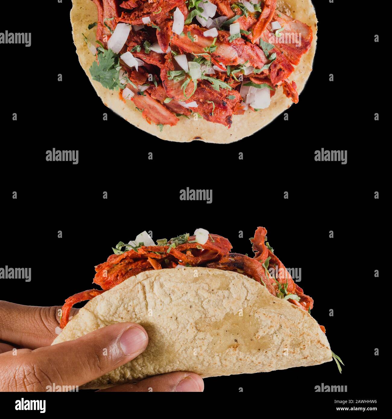 Tacos al pastor design composition on a black background, with a person squeezing lime on it. Authentic mexican tacos with marinated meat, onion, pine Stock Photo