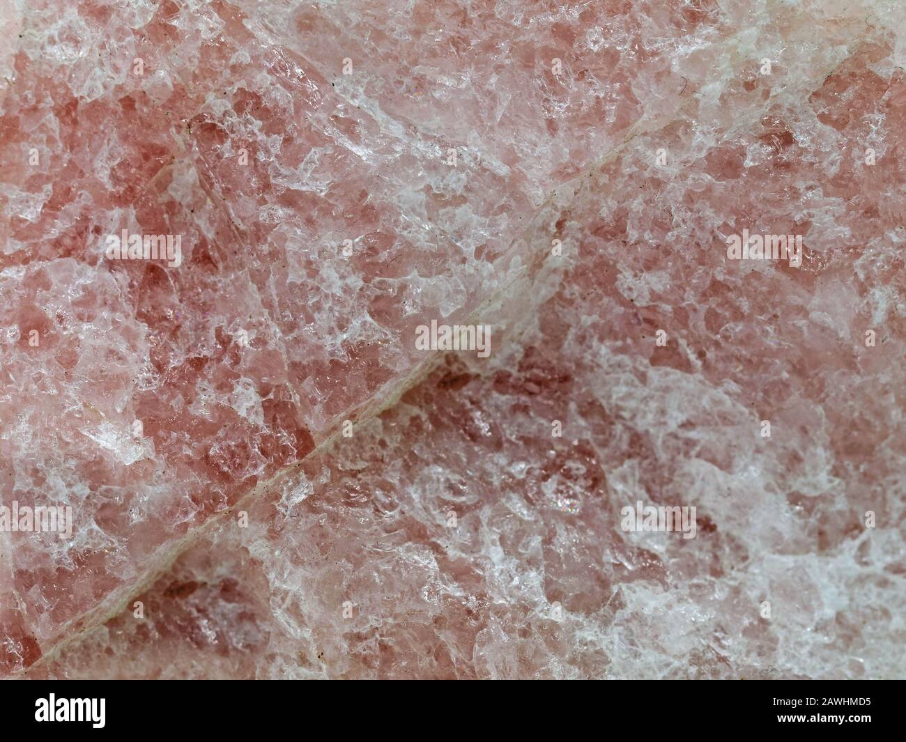 Rose quartz texture background, close up of pink gemstone surface Stock Photo