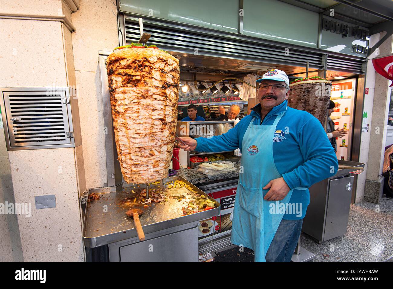 ISTANBUL - JAN 02: Man Seller making traditional Turkish Dish Durum or Kebab in the Street of Istanbul on January 02. 2020 in Turkey Stock Photo