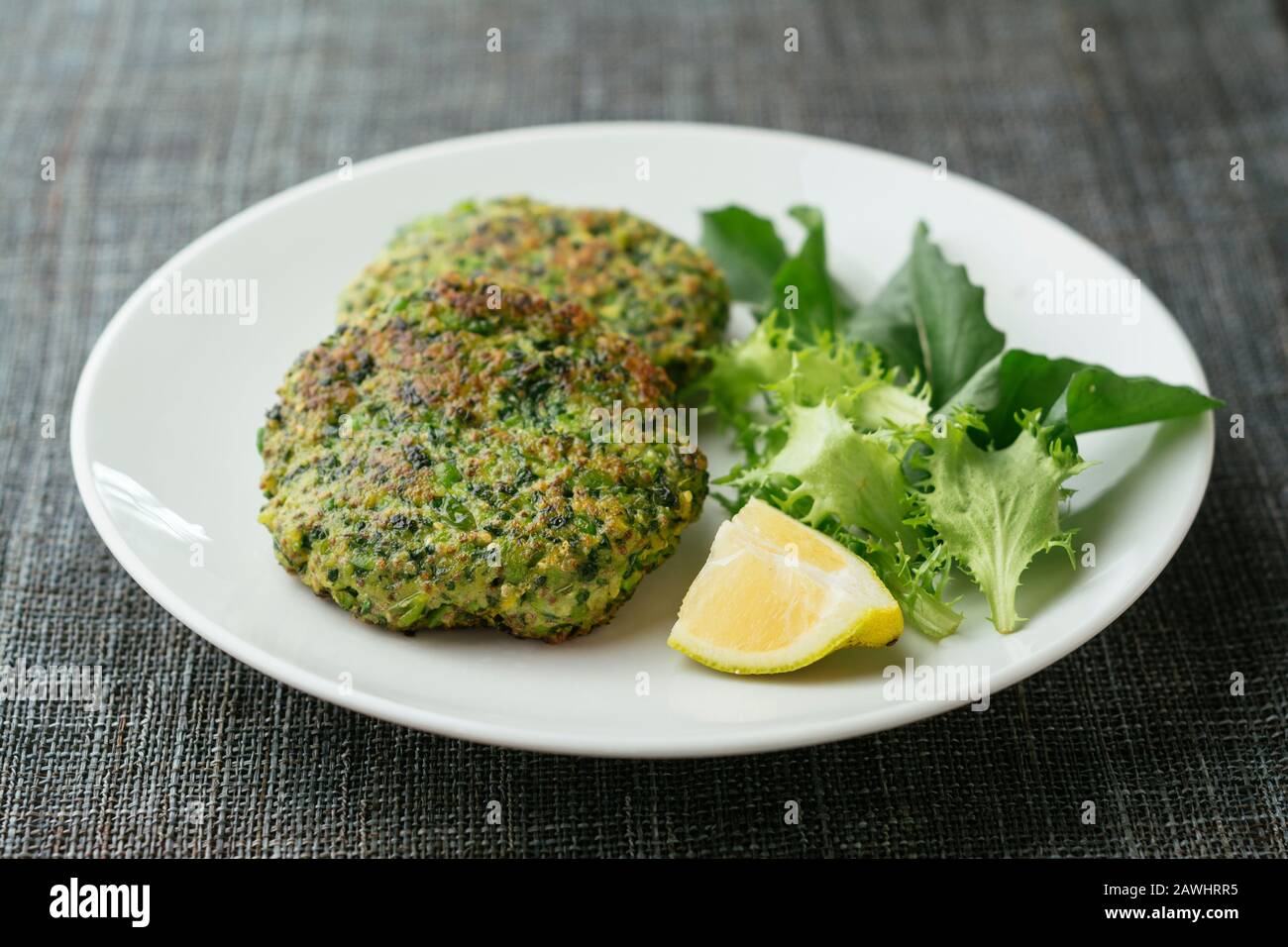 Home made vegan kale and pea patties Stock Photo