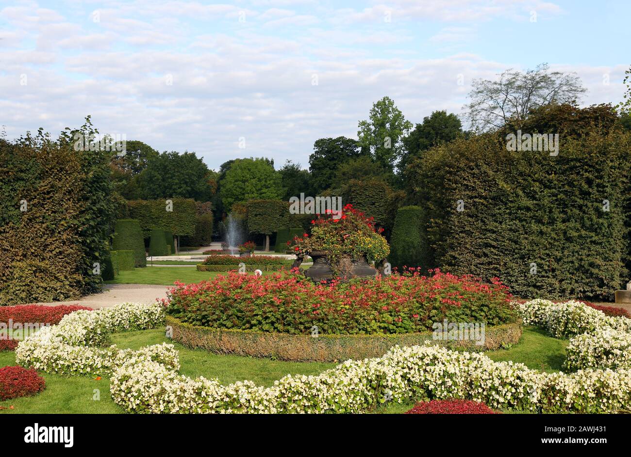 beautiful garden with flowers trees and fountain Stock Photo - Alamy