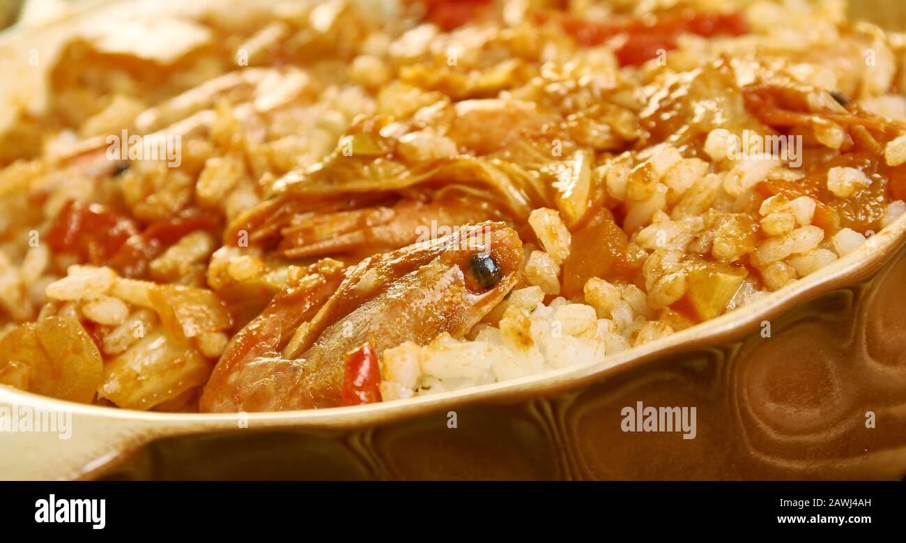 Prawn jambalaya, rice dishes, and its origins are in the traditional