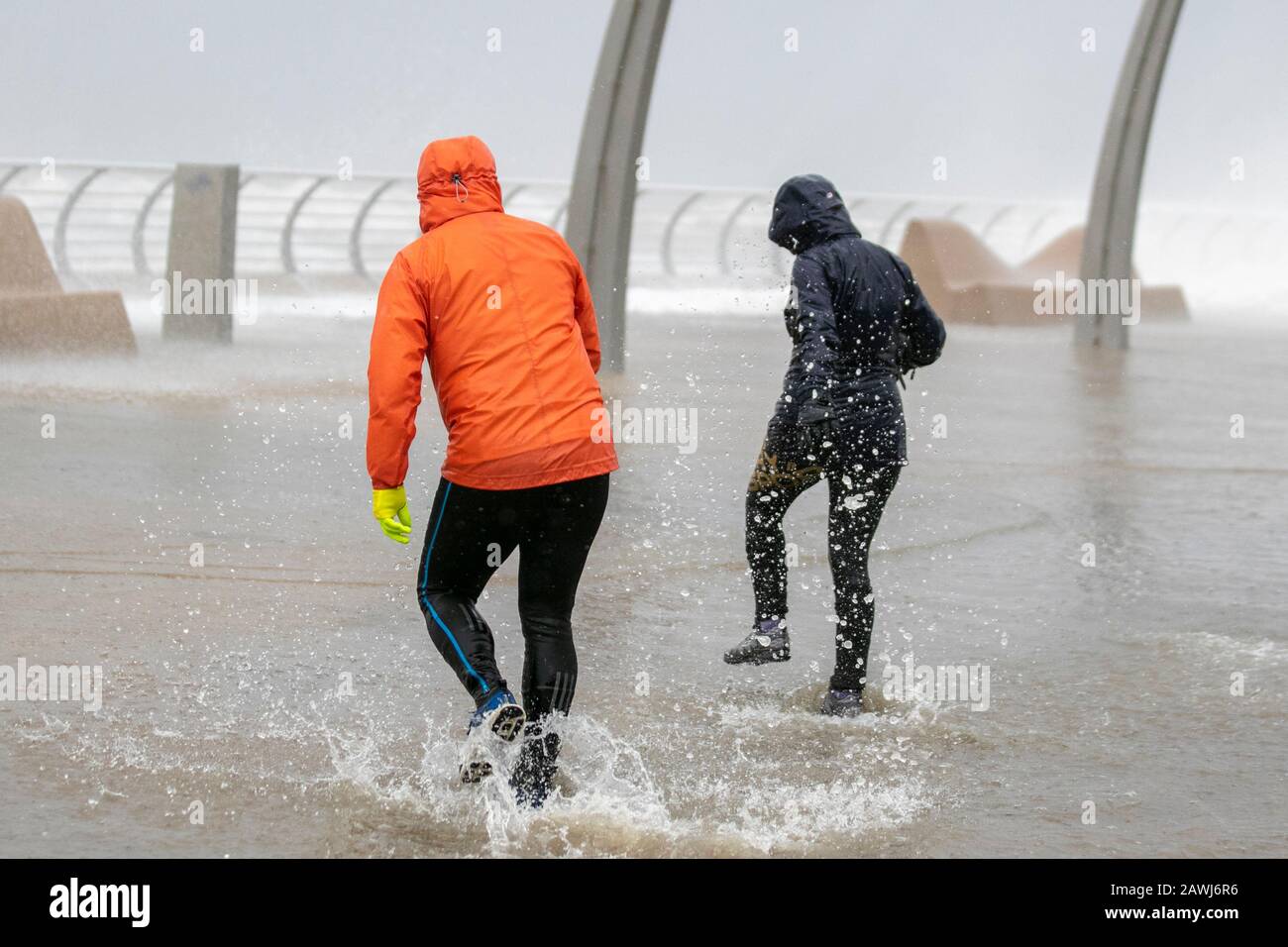 Blackpool, Lancashire. 9th Feb, 2020.   The third named storm of the season, the worst since 2013 arrives in Blackpool. Large waves and debris thrown on coastal roads, seafronts and properties present a risk to life. Wet and windy weather, with winds as strong as 60mph going up to 70mph in more exposed areas. Credit:MediaWorldImages/AlamyLiveNews Stock Photo