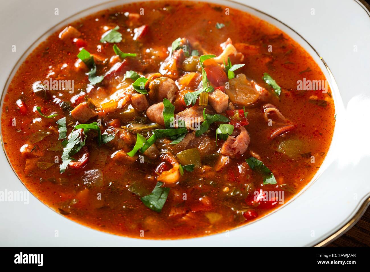 Goulash soup with meat and vegetables - traditional Hungarian food Stock Photo