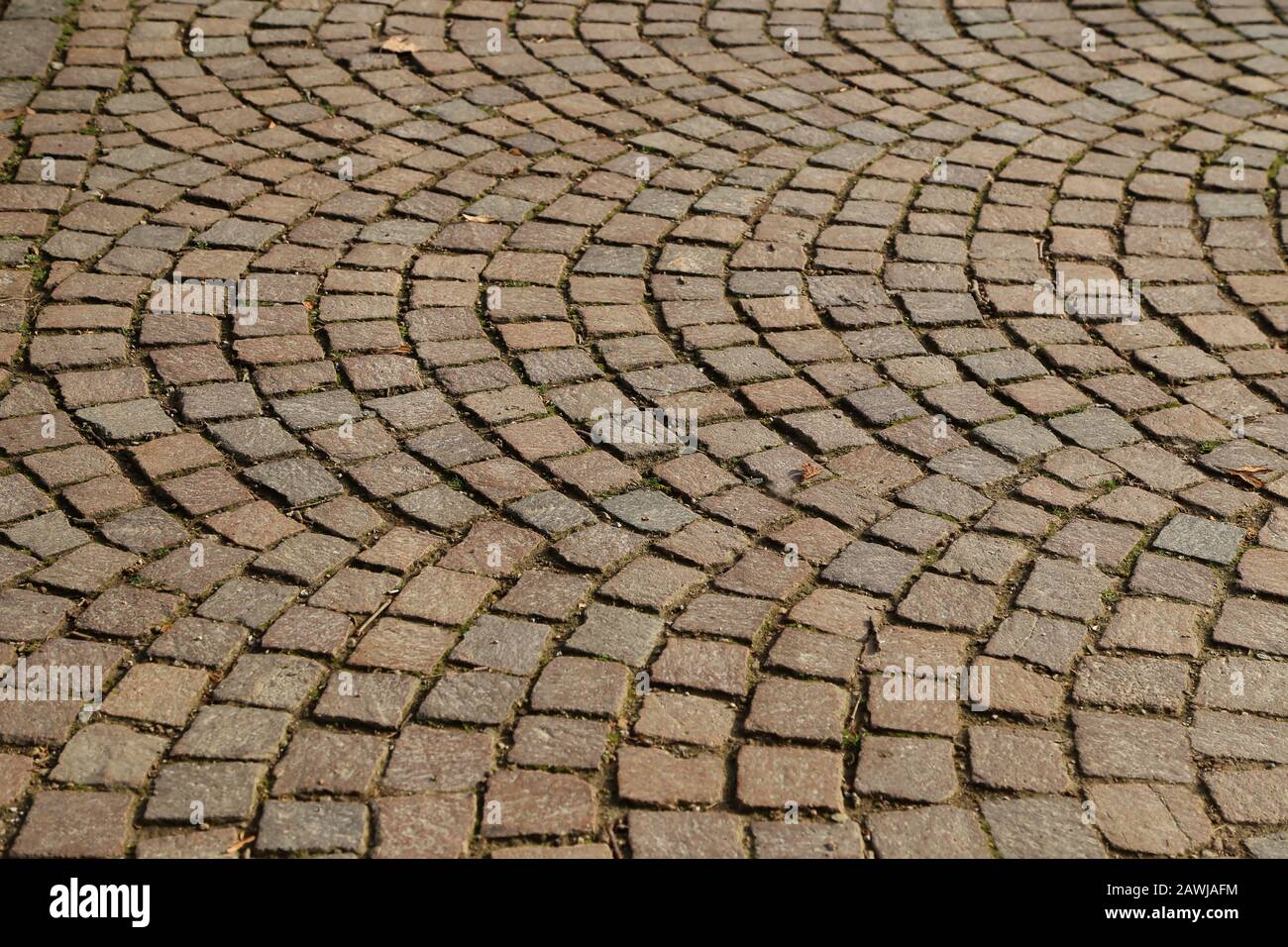 Abstract background of old cobblestone pavement close-up Stock Photo ...
