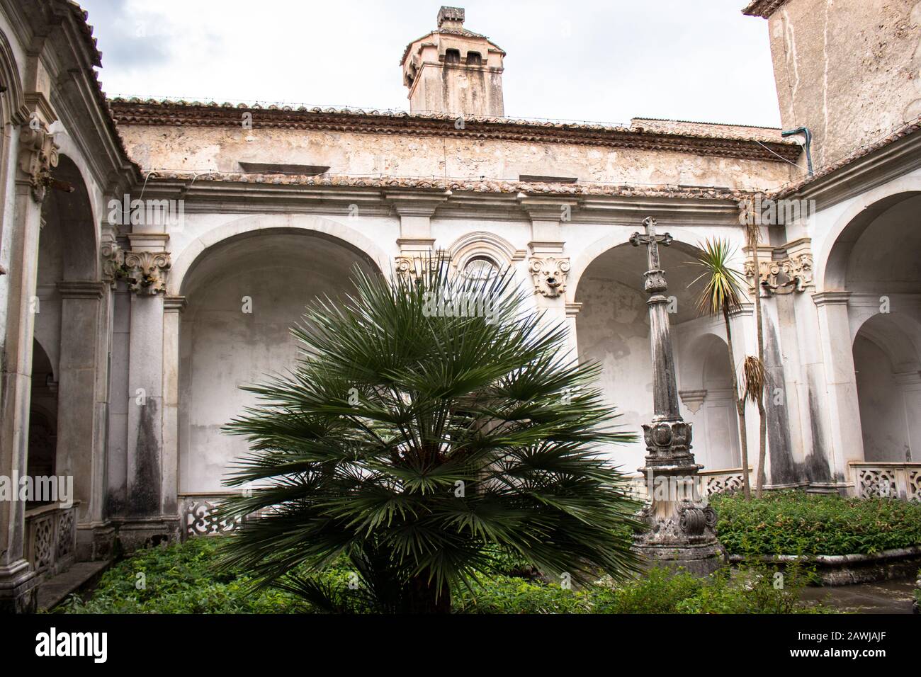 Padula, Salerno, Campania, Italy - May 21, 2017: Cloister of the ancient cemetery in the Certosa di San Lorenzo Stock Photo