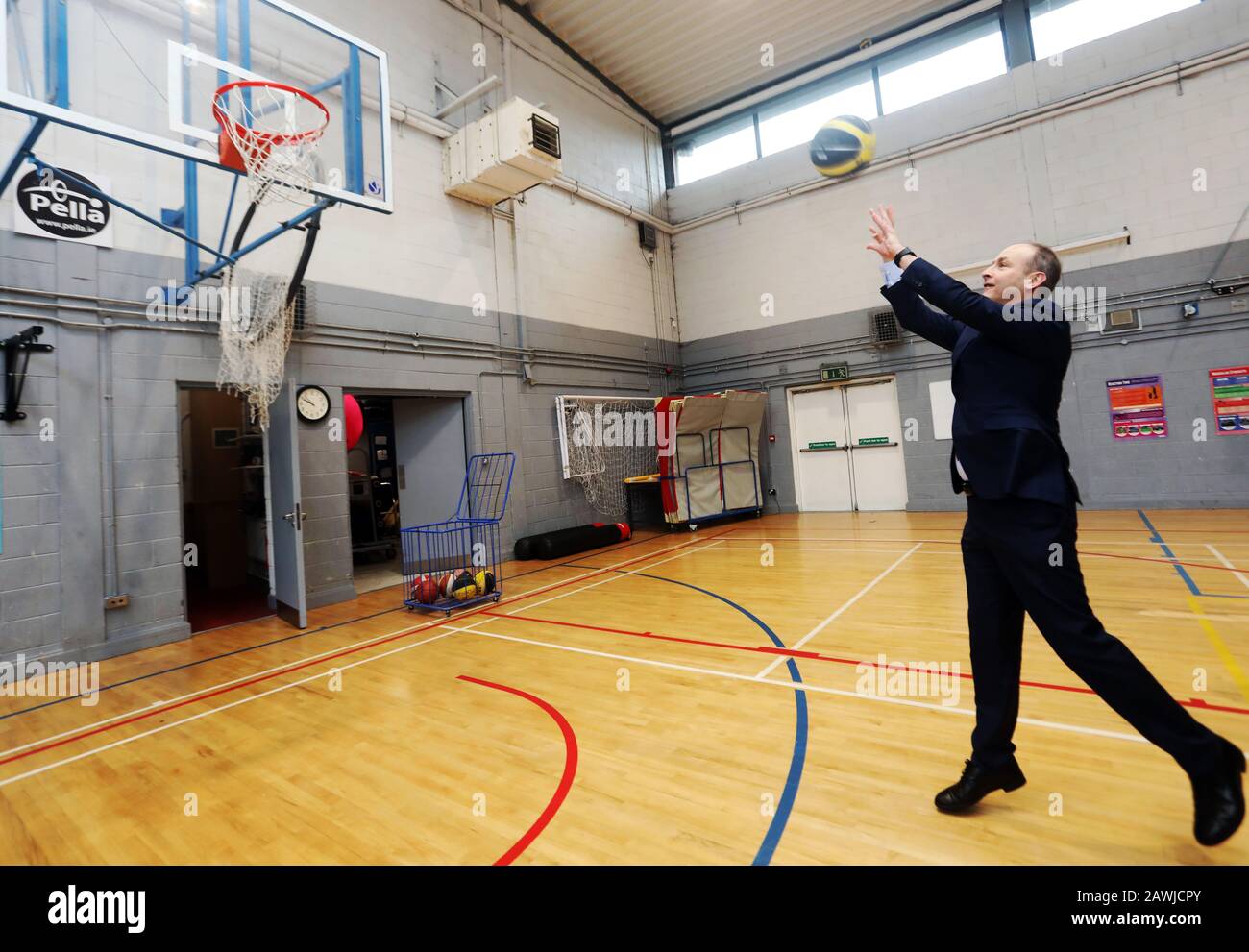 Dublin, Ireland. 31/1/2020 Fianna Fail General Election 2020. Pictured is Fianna Fail party leader Micheal Martin playing basketball in St Colmcille's Community School, Knocklyon, Dublin, as he begins a day of canvassing in the area. Photo: Leah Farrell / RollingNews.ie Stock Photo