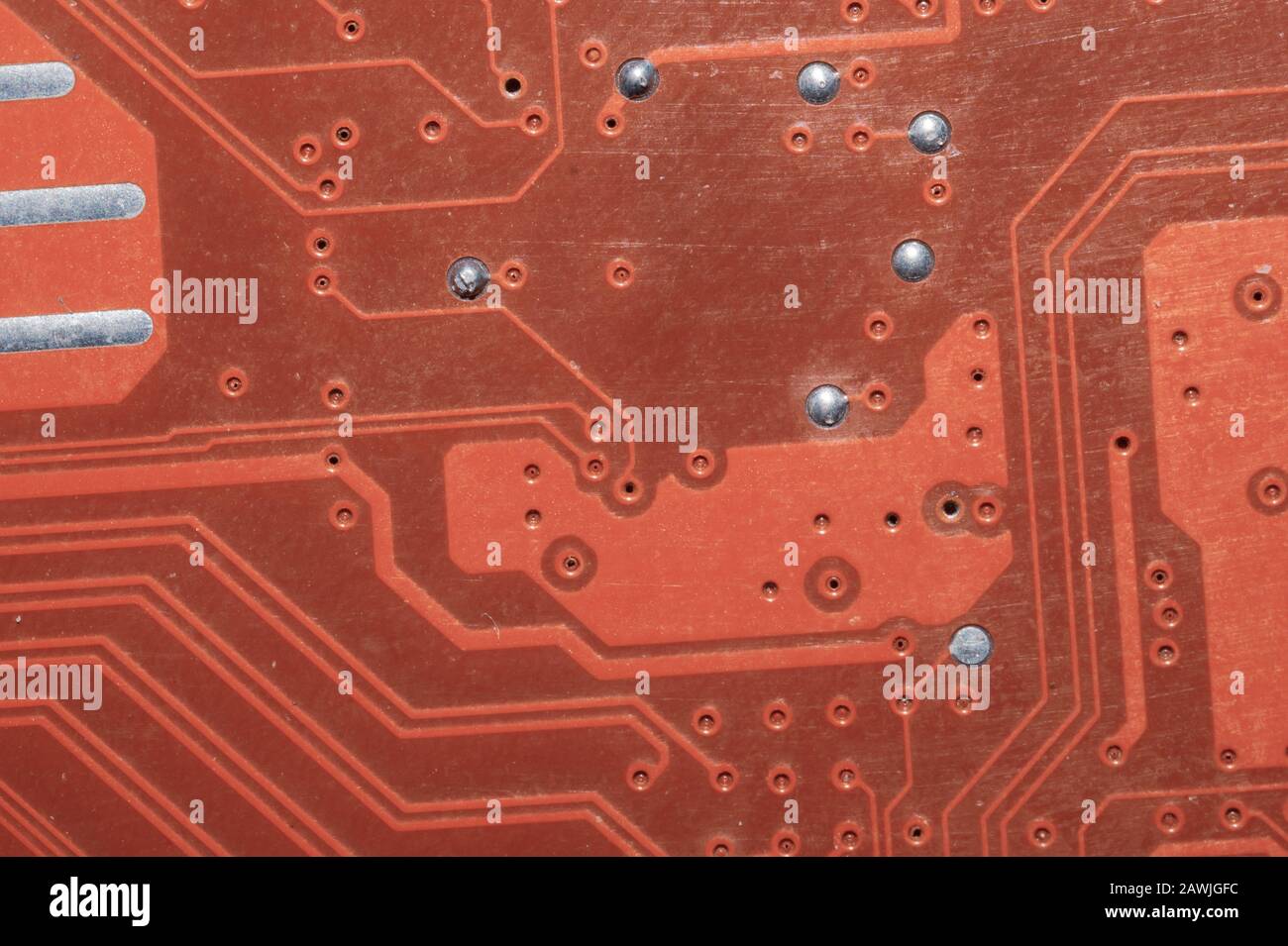 Spoiled motherboard close up. circuit board with dust and defects ...