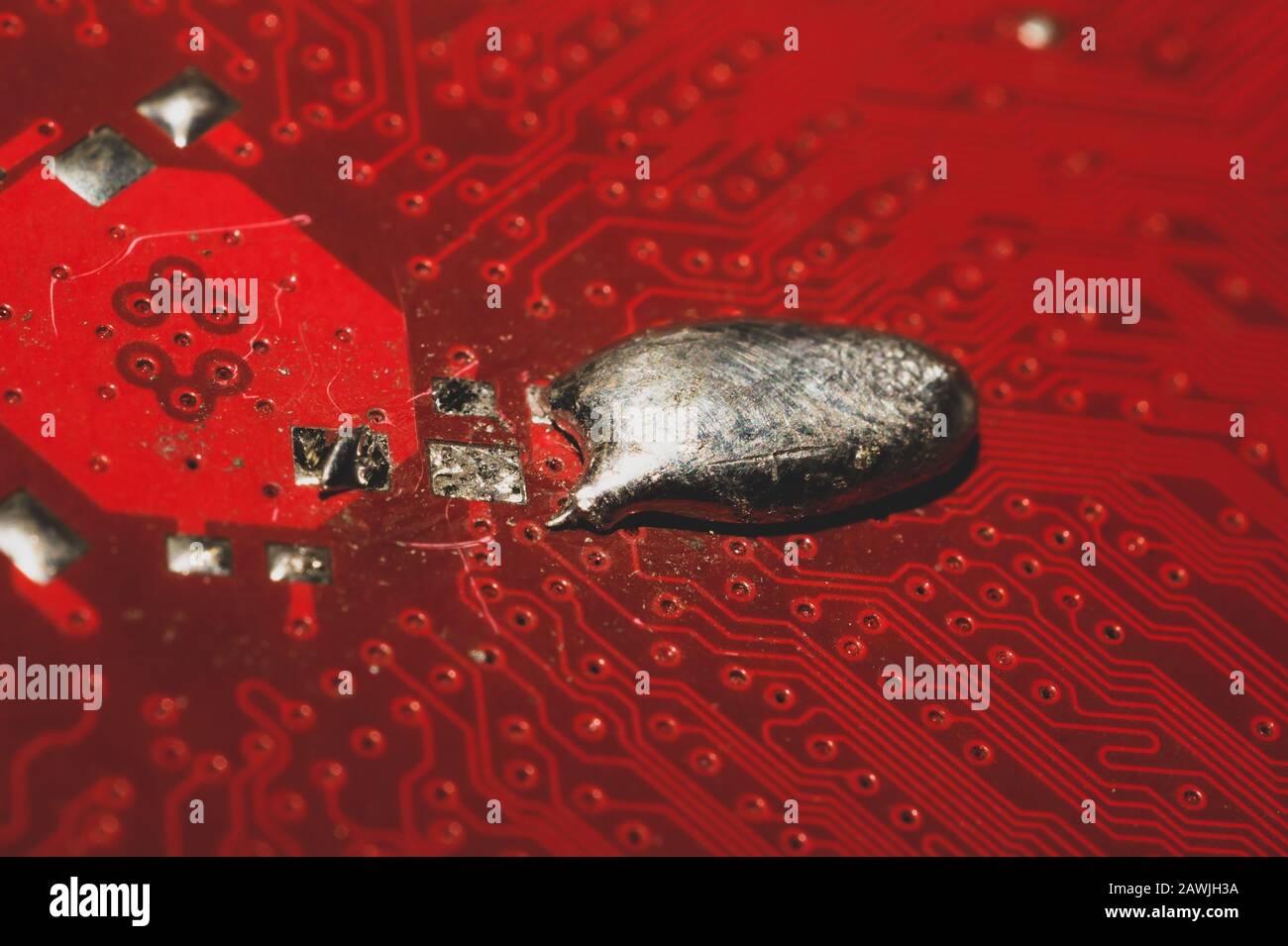 Spoiled motherboard close up. circuit board with dust and defects ...