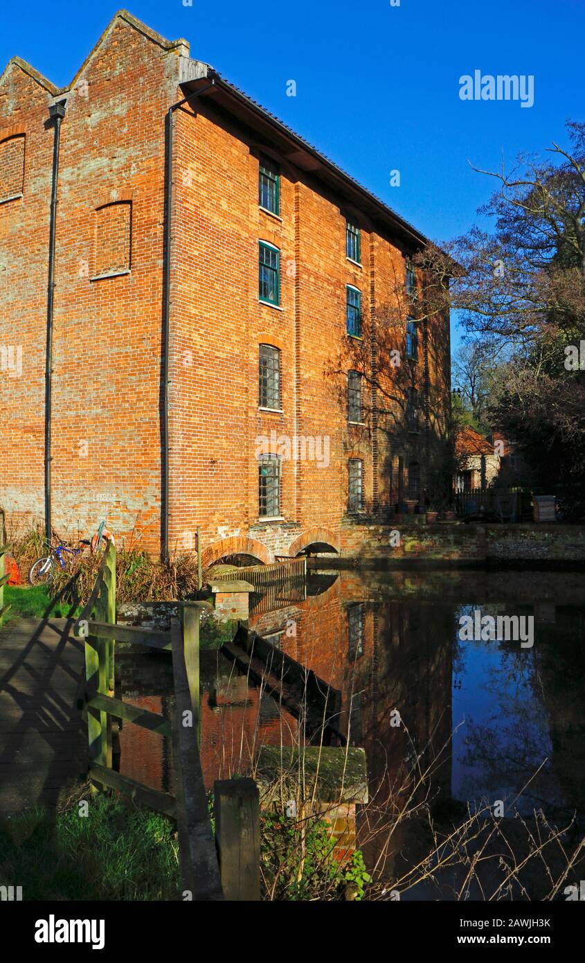 A view of Letheringsett Watermill on the River Glaven near Holt at Letheringsett, Norfolk, England, United Kingdom, Europe. Stock Photo