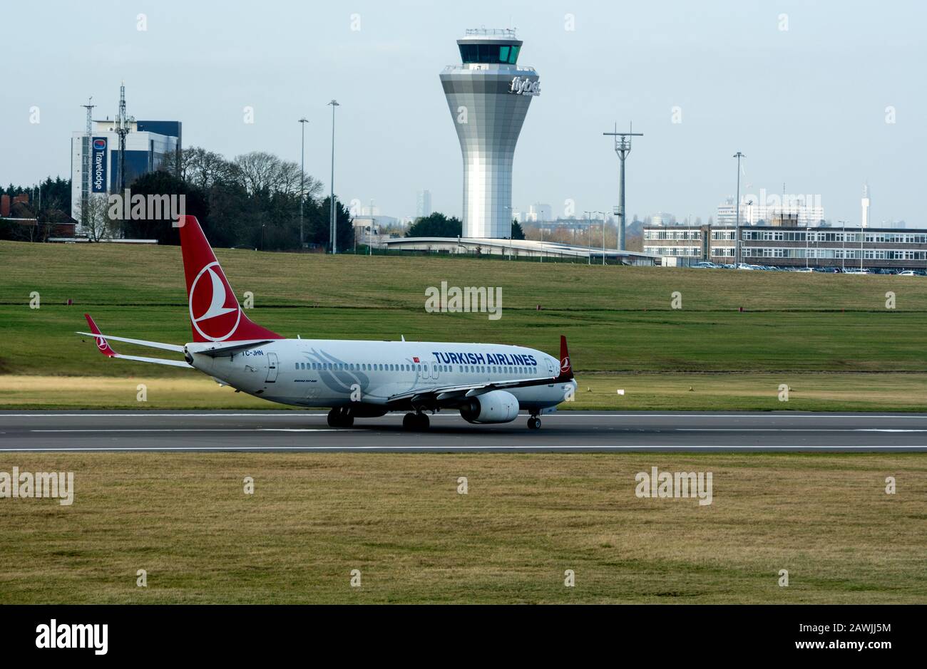 Turkish Airlines Boeing 737-8F2 taking off at Birmingham Airport, UK (TC-JHN) Stock Photo