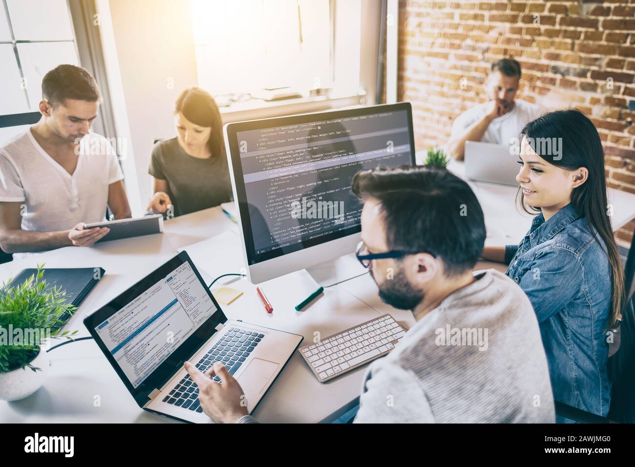 Developing programming and coding technologies. Website design. Programmer working in a software develop company office. Stock Photo
