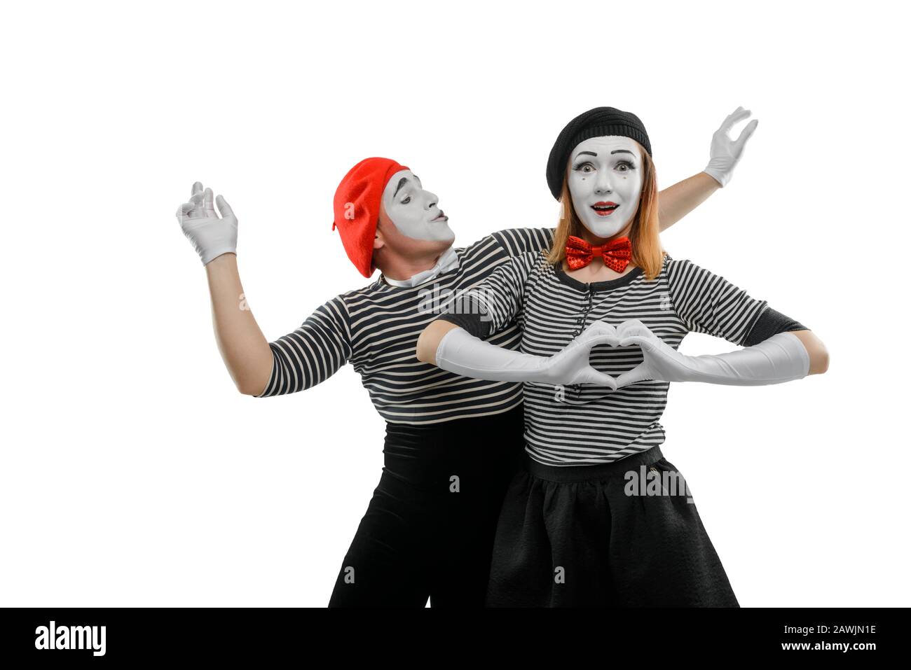 Two mimes on white background. Mime actress with excited face Stock