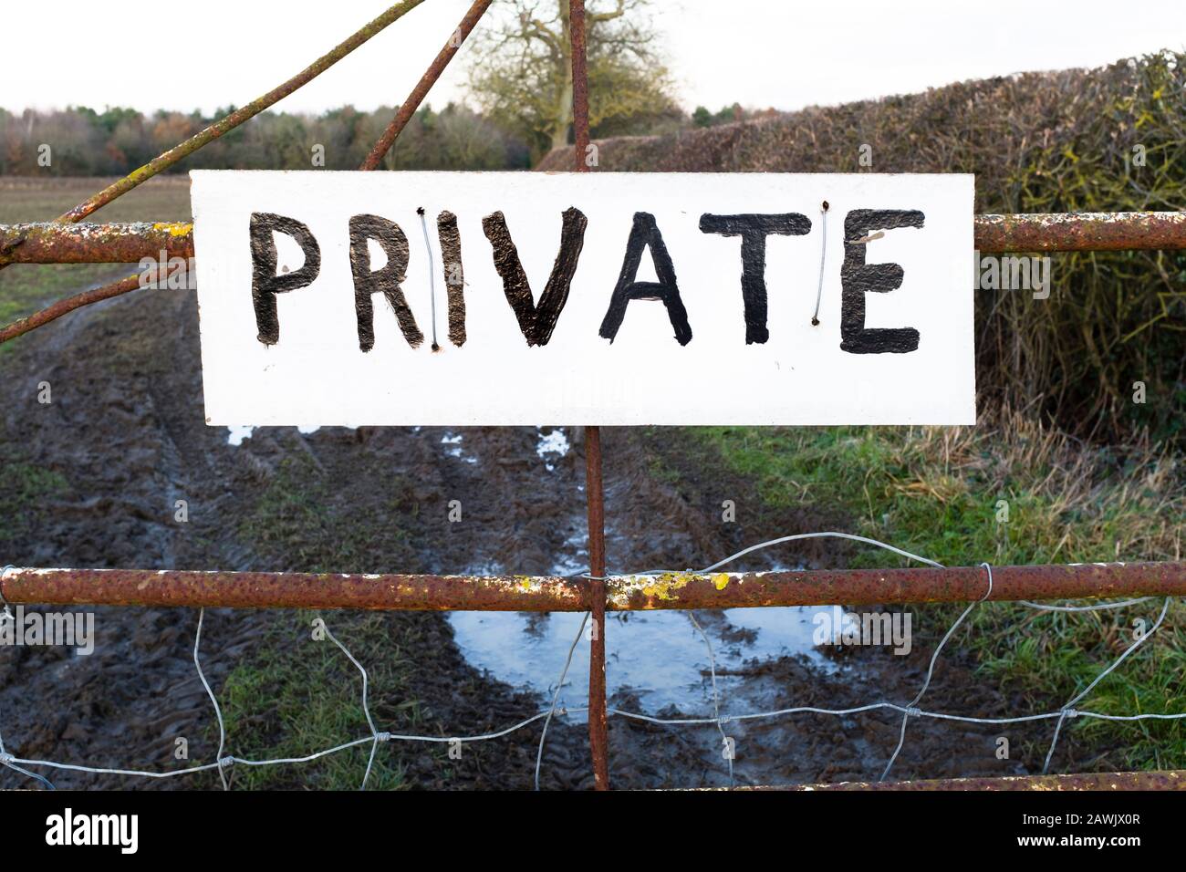 Private sign outdoors on a gate to a field, UK Stock Photo