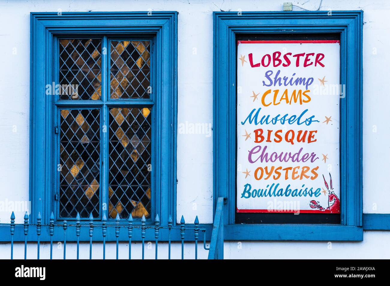 Seafood Restaurant Sign - advertising Lobster Shrimp Clams Mussels Bisque Chowder Oysters Bouillabaisse Stock Photo