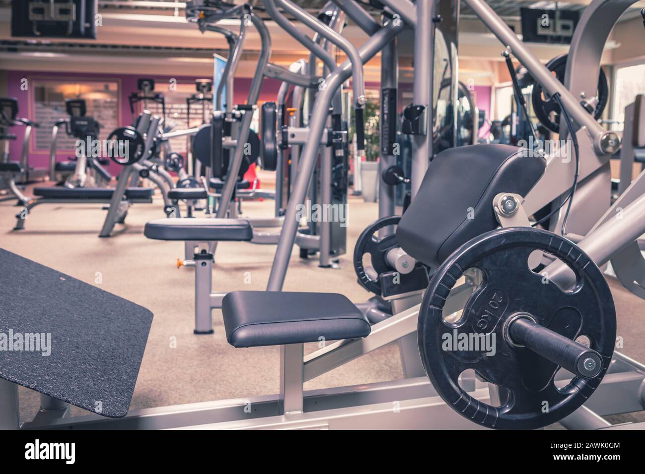 diverse equipment and machines at the gym room Stock Photo Alamy