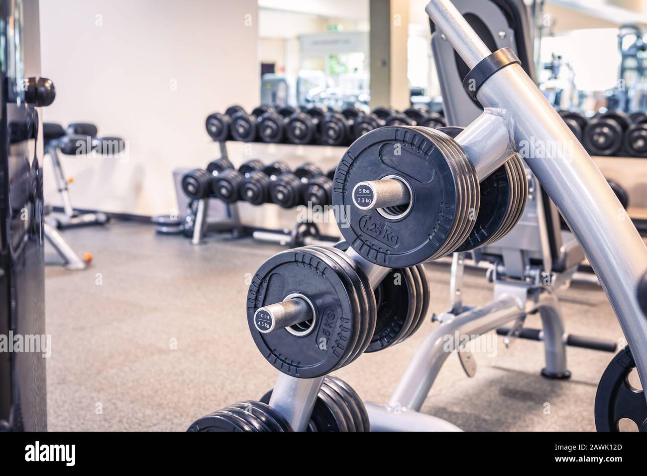 diverse equipment and machines at the gym room Stock Photo Alamy