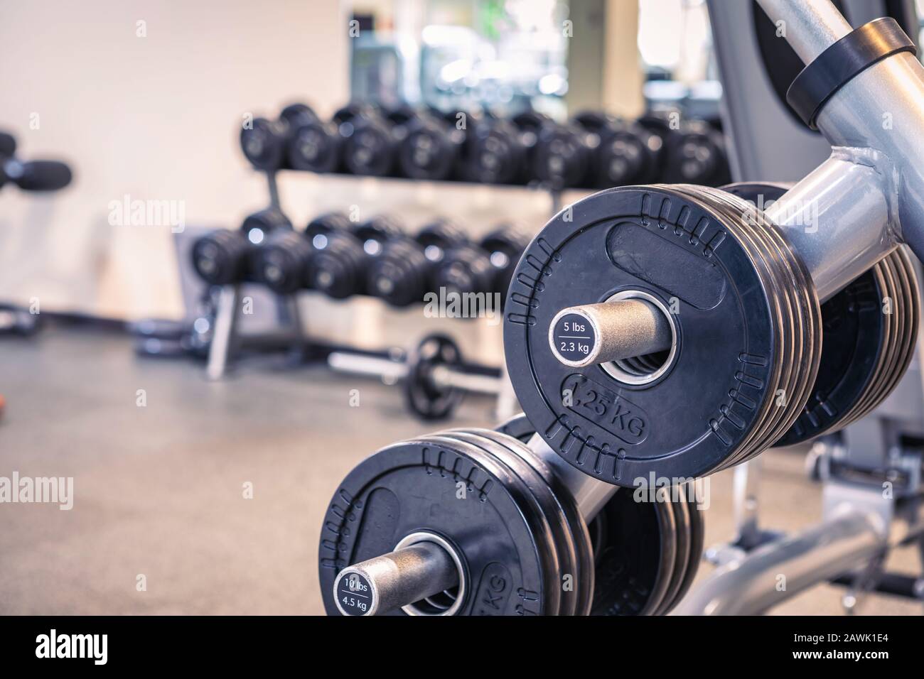 diverse equipment and machines at the gym room Stock Photo Alamy