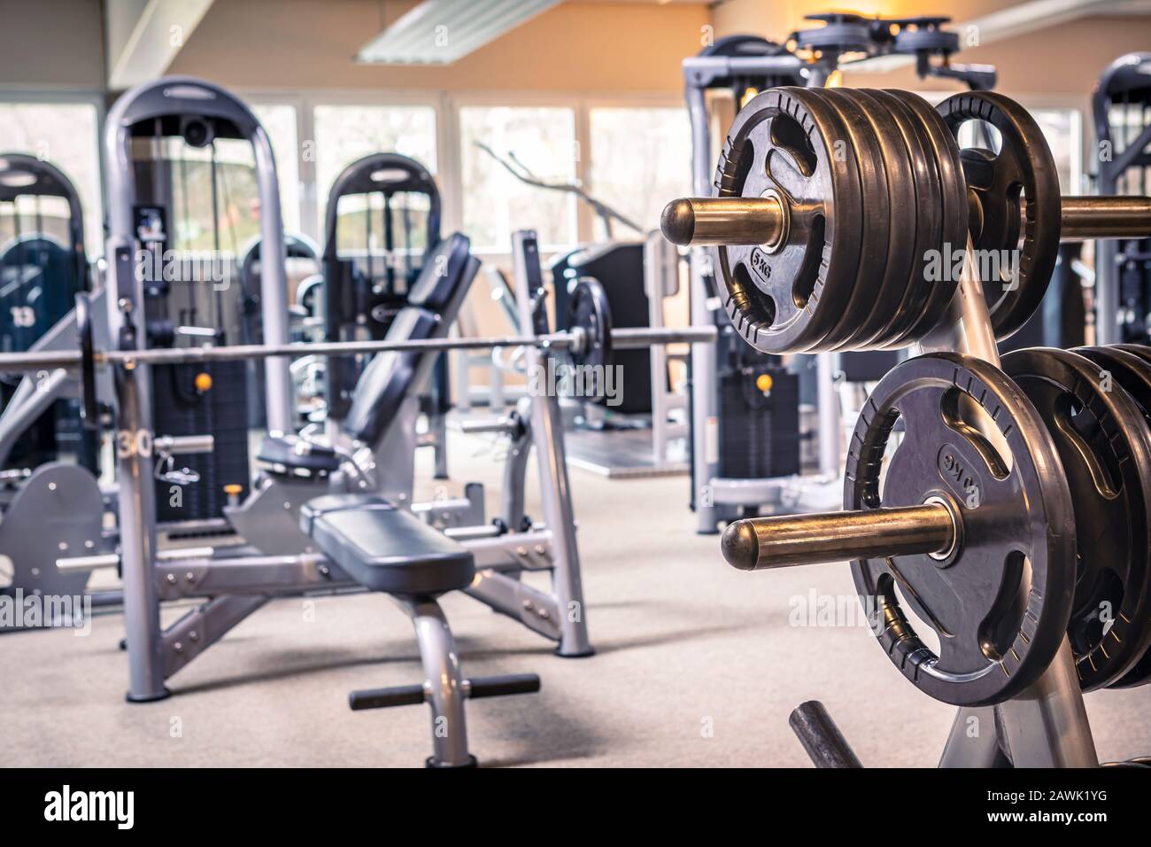 diverse equipment and machines at the gym room Stock Photo Alamy
