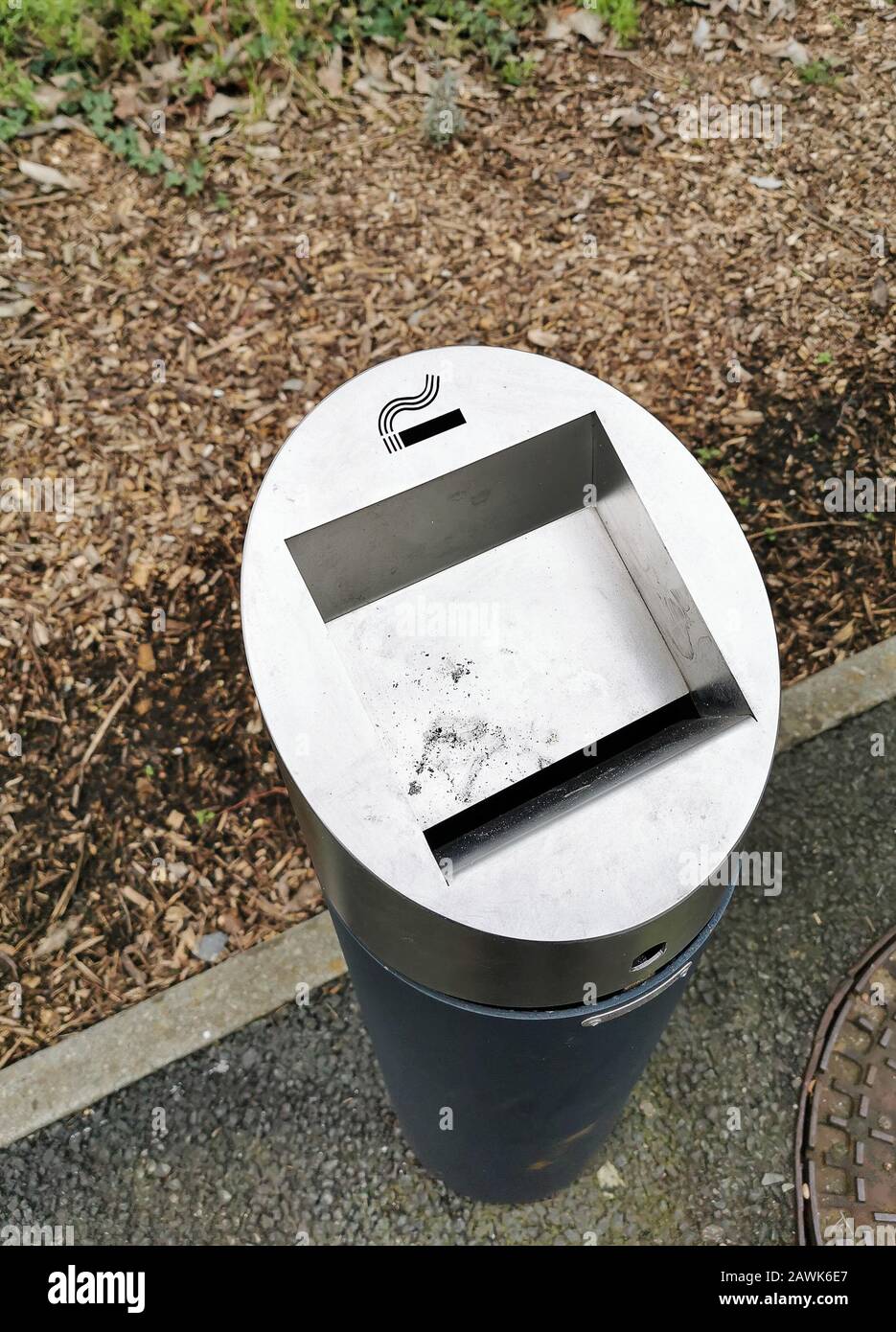 Outdoor modern metallic public ashtray, in smoking area zone Stock Photo