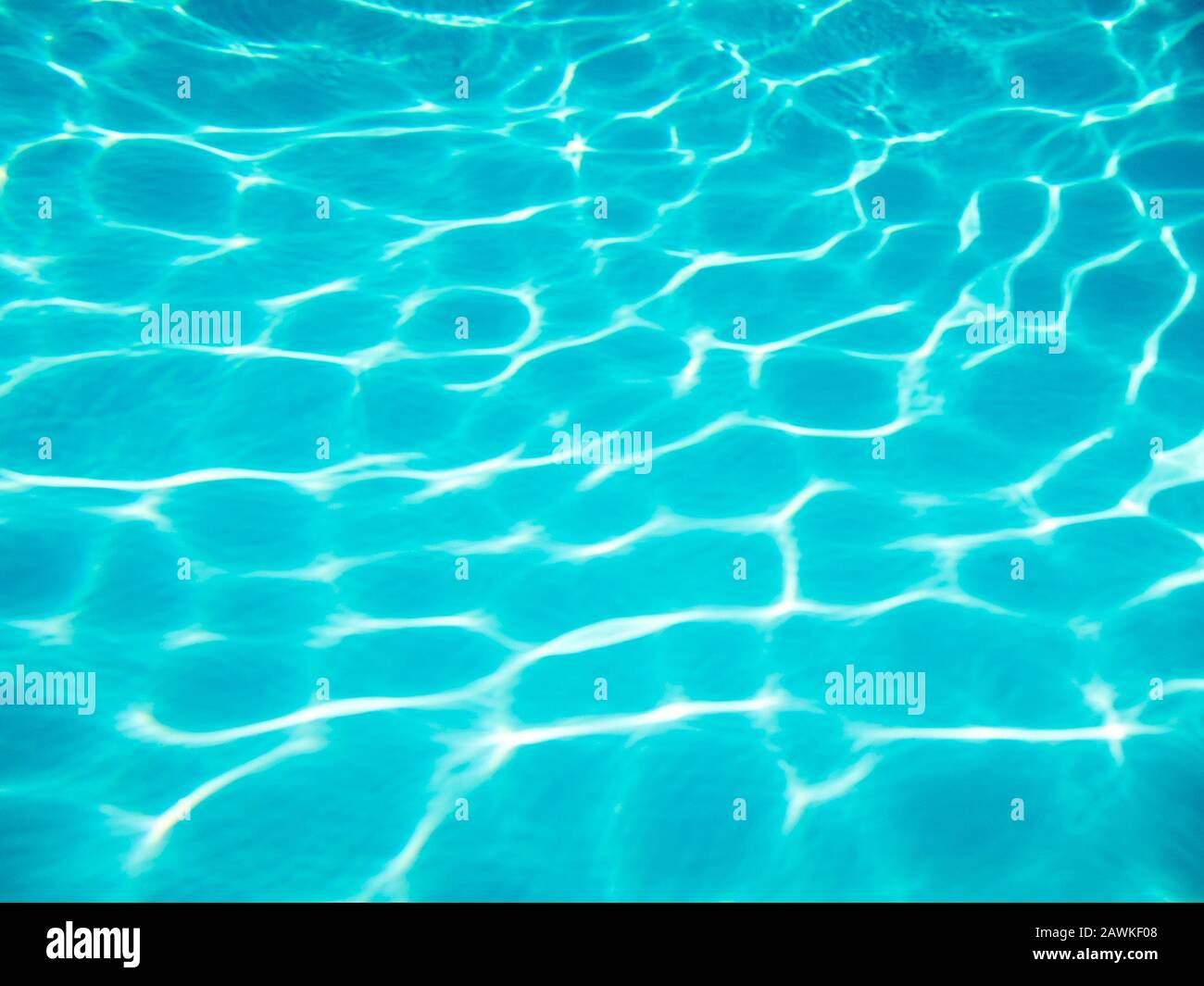 Full frame background of rounded wave patterns sparkling on the bottom ...