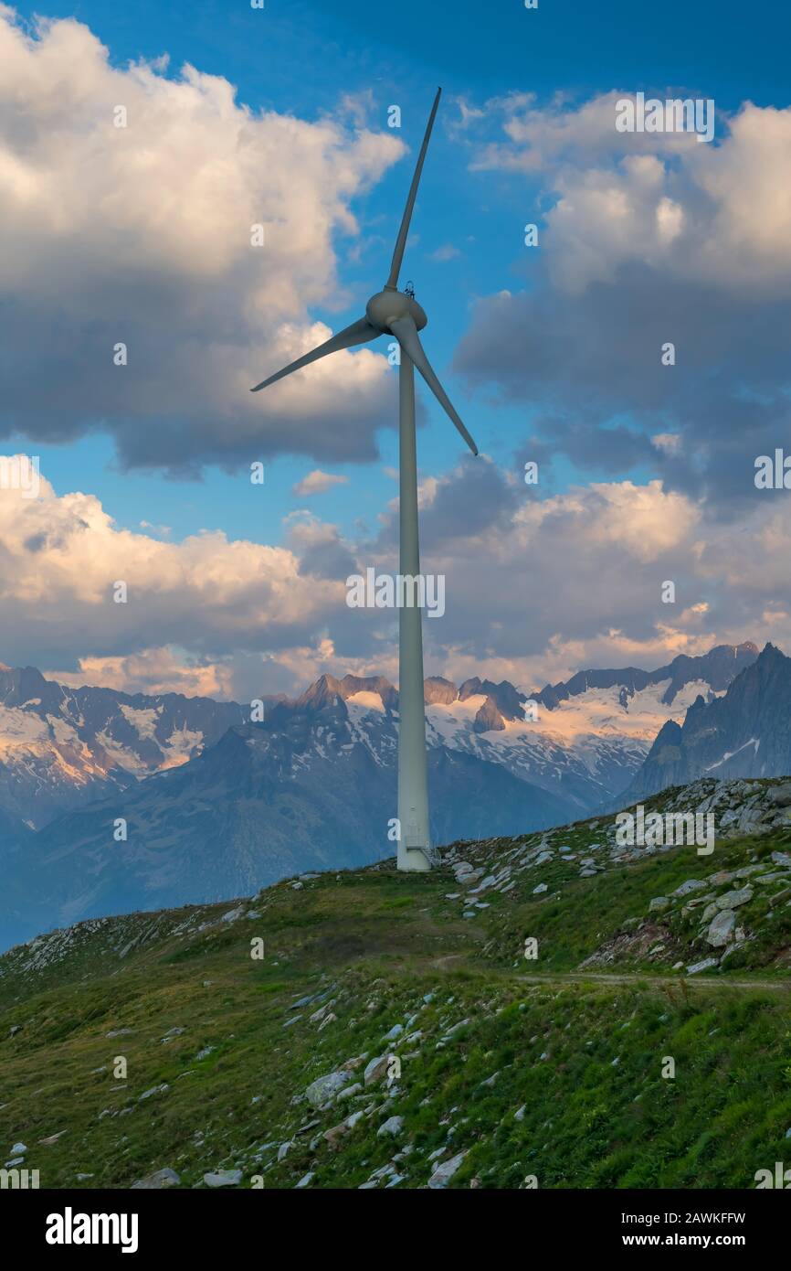 A wind turbine in the mountains. Stock Photo