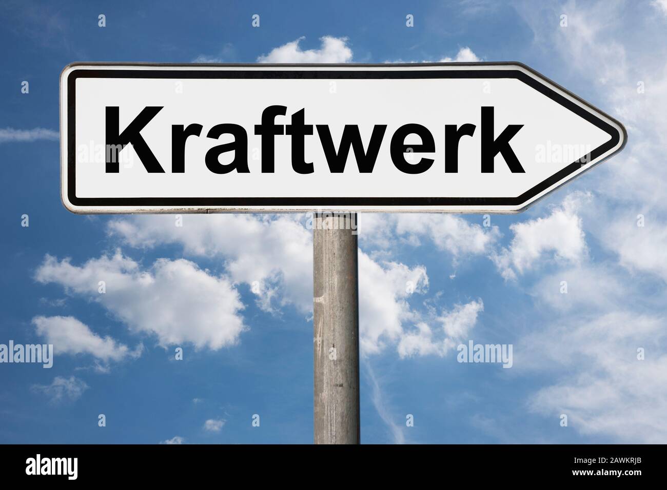 Detail photo of a signpost with the inscription Kraftwerk (Power station) Stock Photo
