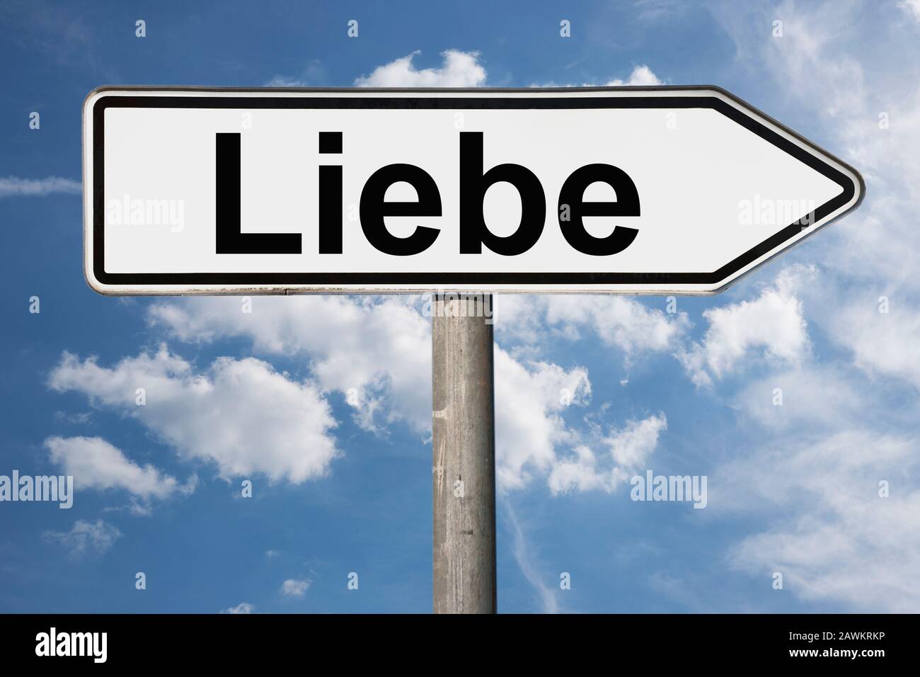 Detail photo of a signpost with the inscription Liebe (Love) Stock Photo