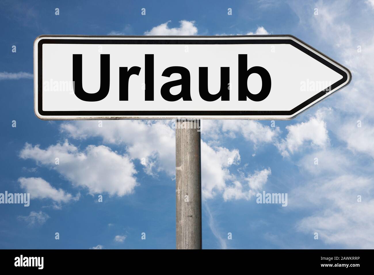 Detail photo of a signpost with the inscription Urlaub (Holiday) Stock Photo