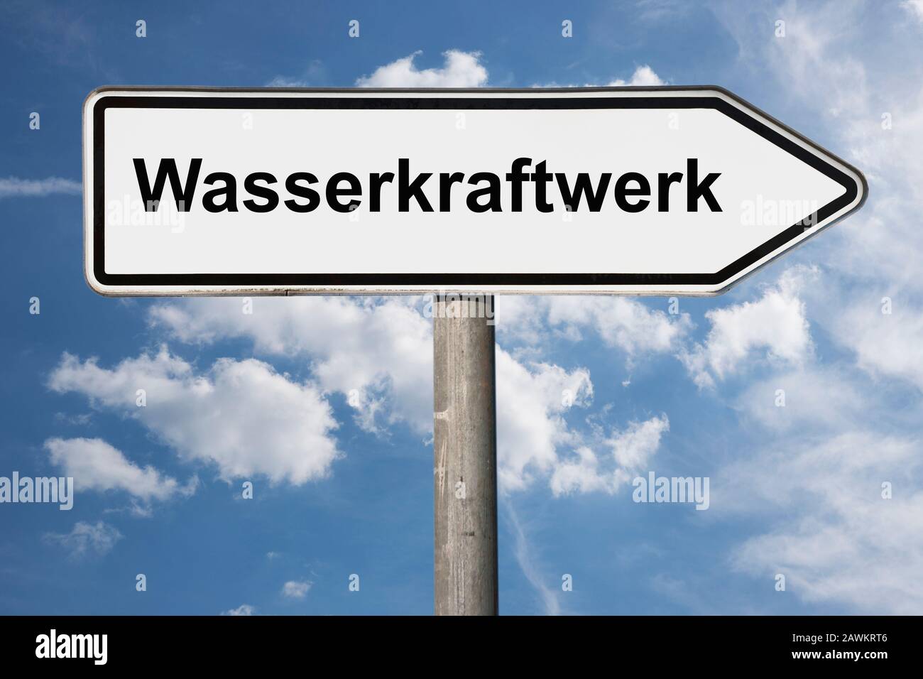 Detail photo of a signpost with the inscription Wasserkraftwerk (Hydroelectric power station) Stock Photo